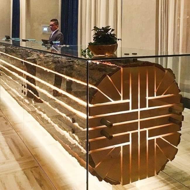 Photo Of The Day  - Perfectly cut and assembled log used as a reception desk