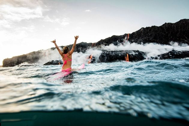 STUNNING MOMENT: This Adventure Seeking Woman swims near lava during volcanic eruption